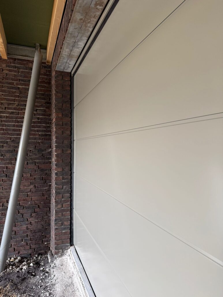 Sectionaaldeur – Vlak – Glad – RAL7030 steengrijs